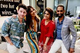 At their Los Angeles home, Priyanka Chopra and Nick Jonas entertain guests for dinner